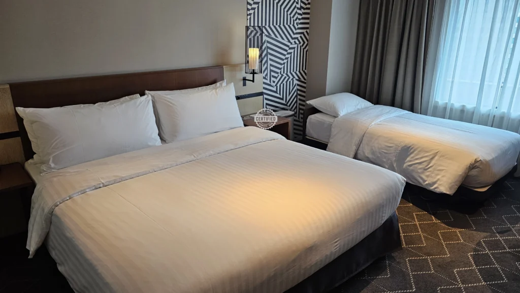 Room photo – setup with the standard bed and an extra bed added